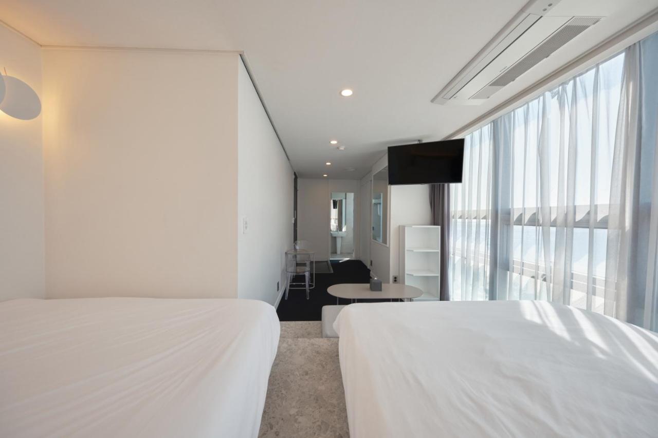 Uh Suite The Haeundae Busan Esterno foto